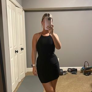 Tight black mini dress